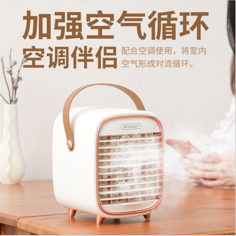Amazon portable water-cooling fan mini mute humidification small fan desktop cooling fan