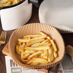 French fries in a paper bowl with oil-resistant, and non-stick properties.